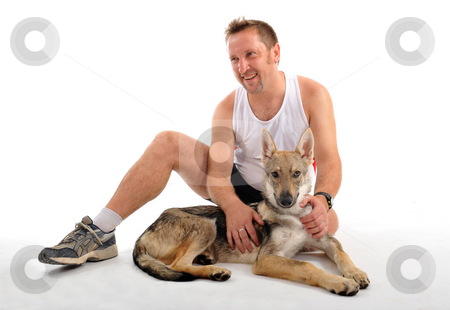 To use this stock image in your creative project, please select the size you need over to the right and click the "Add to Cart" button.
Your downloaded image will come with the Cutcaster watermark removed so don’t worry about the watermark you see on this page. After sport training stock photo, Portrait of a man resting after sport training with his puppy by Bonzami Emmanuelle