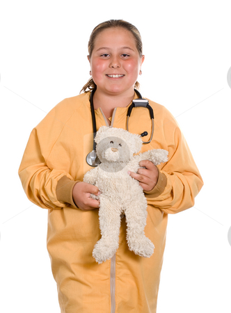 To use this stock image in your creative project, please select the size you need over to the right and click the "Add to Cart" button.
Your downloaded image will come with the Cutcaster watermark removed so don’t worry about the watermark you see on this page. Child Nurse stock photo, A young girl pretending to be a nurse and holding a stuffed bear, isolated against a white background by Richard Nelson