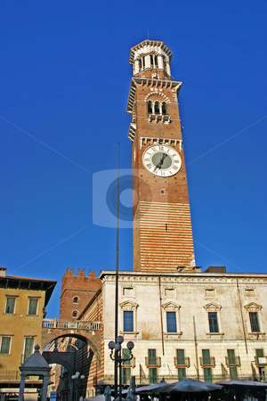 To use this stock image in your creative project, please select the size you need over to the right and click the "Add to Cart" button.
Your downloaded image will come with the Cutcaster watermark removed so don’t worry about the watermark you see on this page. View of the Lamberti Tower in Verona, Italy stock photo, View of the Lamberti Tower and Whalebone Arch in the Piazza delle Erbe in Verona, Italy by Stephen Goodwin