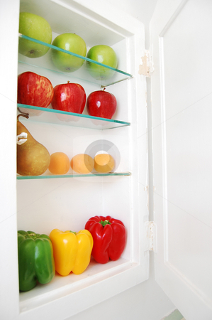 To use this stock image in your creative project, please select the size you need over to the right and click the "Add to Cart" button.
Your downloaded image will come with the Cutcaster watermark removed so don’t worry about the watermark you see on this page. Fruit and Veggie Prescription stock photo, Colorful fruit and veggies on the shelves of a medicine cabinet. by Tina Kim