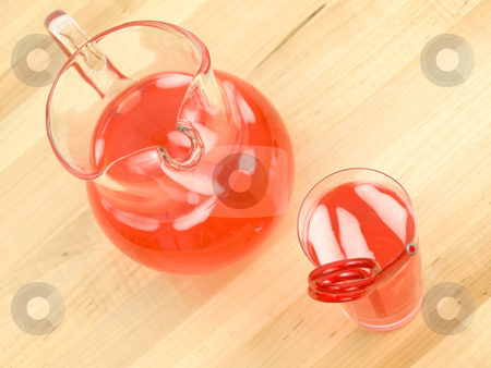 To use this stock image in your creative project, please select the size you need over to the right and click the "Add to Cart" button.
Your downloaded image will come with the Cutcaster watermark removed so don’t worry about the watermark you see on this page. Juice in Pitcher and Glass stock photo, Juice in pitcher and glass on wooden background by John Teeter