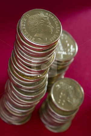 To use this stock image in your creative project, please select the size you need over to the right and click the "Add to Cart" button.
Your downloaded image will come with the Cutcaster watermark removed so don’t worry about the watermark you see on this page. Stack of australian dollar coins stock photo, A large stack of australian dollar coins on a red background by Stephen Gibson