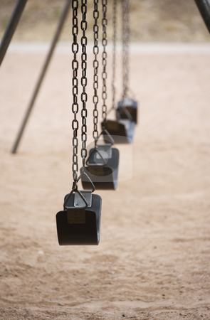 To use this stock image in your creative project, please select the size you need over to the right and click the "Add to Cart" button.
Your downloaded image will come with the Cutcaster watermark removed so don’t worry about the watermark you see on this page. Playground Swings stock photo, Old style playground swings with chains and rubber seats by Scott Griessel