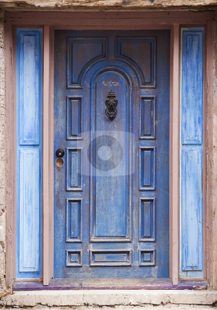 To use this stock image in your creative project, please select the size you need over to the right and click the "Add to Cart" button.
Your downloaded image will come with the Cutcaster watermark removed so don’t worry about the watermark you see on this page. Old Blue Door stock photo, Old peeling blue door with metal knocker by Scott Griessel