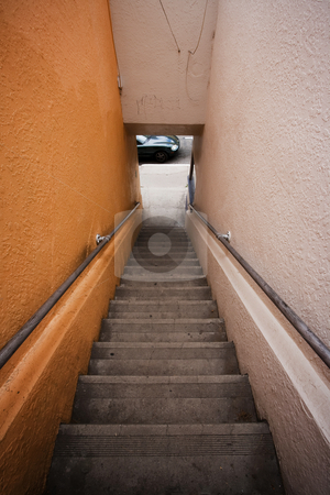 To use this stock image in your creative project, please select the size you need over to the right and click the "Add to Cart" button.
Your downloaded image will come with the Cutcaster watermark removed so don’t worry about the watermark you see on this page. Long stairway to the street stock photo, Long stairway to street where car is parked by Scott Griessel