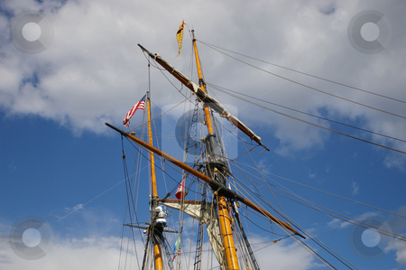 To use this stock image in your creative project, please select the size you need over to the right and click the "Add to Cart" button.
Your downloaded image will come with the Cutcaster watermark removed so don’t worry about the watermark you see on this page. Ships Mast stock photo, A ships mast reaching high into the sky. by Tom Weatherhead