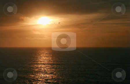 To use this stock image in your creative project, please select the size you need over to the right and click the "Add to Cart" button.
Your downloaded image will come with the Cutcaster watermark removed so don’t worry about the watermark you see on this page. Sunset stock photo, Sunset over sea on a athlantic beach by Marc Torrell