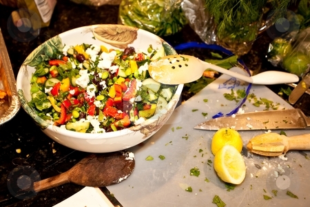 To use this stock image in your creative project, please select the size you need over to the right and click the "Add to Cart" button.
Your downloaded image will come with the Cutcaster watermark removed so don’t worry about the watermark you see on this page. Greek Salad stock photo, Greek salad is essentially a tomato salad made of sliced or chopped tomatoes with a few slices of cucumber, red onion, feta cheese, and kalamata olives, seasoned with salt, black pepper, oregano, and basil and dressed with olive oil. by Mariusz Jurgielewicz