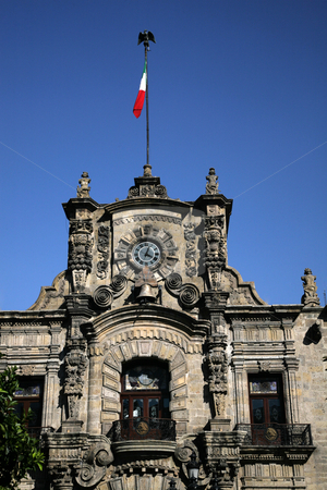 To use this stock image in your creative project, please select the size you need over to the right and click the "Add to Cart" button.
Your downloaded image will come with the Cutcaster watermark removed so don’t worry about the watermark you see on this page. Government Palace Guadalajara Mexico stock photo, Government Palace with Clock Tower and Flag, Guadalajara, Mexico This is a very old Spanish style building. by William Perry