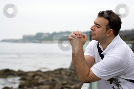 To use this stock image in your creative project, please select the size you need over to the right and click the "Add to Cart" button.
Your downloaded image will come with the Cutcaster watermark removed so don’t worry about the watermark you see on this page. Serious Contemplation stock photo, A young man doing some serious contemplation by the coast. by Todd Arena