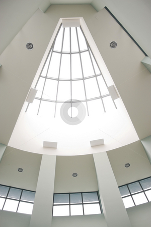 To use this stock image in your creative project, please select the size you need over to the right and click the "Add to Cart" button.
Your downloaded image will come with the Cutcaster watermark removed so don’t worry about the watermark you see on this page. Modern Architectural Interior stock photo, A modern architectural interior with a triangular shaped skylight. by Todd Arena