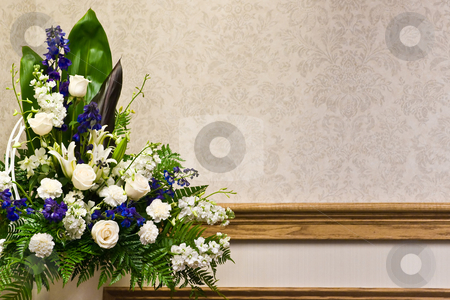 To use this stock image in your creative project, please select the size you need over to the right and click the "Add to Cart" button.
Your downloaded image will come with the Cutcaster watermark removed so don’t worry about the watermark you see on this page. Beautiful Floral Arrangement stock photo, A beautiful white roses floral arrangement with copyspace. by Todd Arena