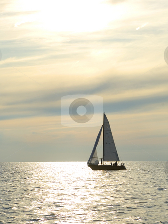 To use this stock image in your creative project, please select the size you need over to the right and click the "Add to Cart" button.
Your downloaded image will come with the Cutcaster watermark removed so don’t worry about the watermark you see on this page. Sunset sail stock photo, Sailboat on the water at dusk with great clouds by Jonathan Hull