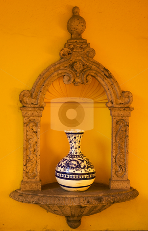 To use this stock image in your creative project, please select the size you need over to the right and click the "Add to Cart" button.
Your downloaded image will come with the Cutcaster watermark removed so don’t worry about the watermark you see on this page. Yellow Adobe Wall Blue Vase Mexico stock photo, Yellow Adobe Wall, Blue White Mexican Vase, Guadalajara Mexico by William Perry
