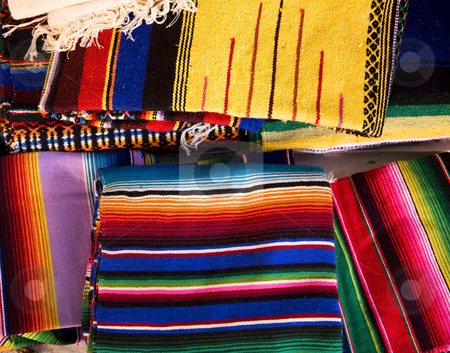 To use this stock image in your creative project, please select the size you need over to the right and click the "Add to Cart" button.
Your downloaded image will come with the Cutcaster watermark removed so don’t worry about the watermark you see on this page. Colorful Mexican Blankets stock photo, Colorful Mexican Blankets Guanajuato Mexico by William Perry