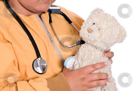 To use this stock image in your creative project, please select the size you need over to the right and click the "Add to Cart" button.
Your downloaded image will come with the Cutcaster watermark removed so don’t worry about the watermark you see on this page. Stuffed Animal Care stock photo, Closeup of a young girl holding a stuffed bear while wearing a stethoscope, isolated against a white background by Richard Nelson