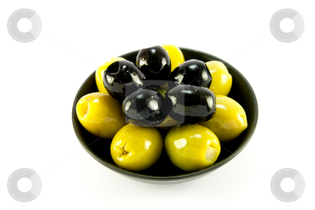 To use this stock image in your creative project, please select the size you need over to the right and click the "Add to Cart" button.
Your downloaded image will come with the Cutcaster watermark removed so don’t worry about the watermark you see on this page. Green and Black Olives in a Bowl stock photo, Green and black olives in a small black bowl on a white background by Keith Wilson