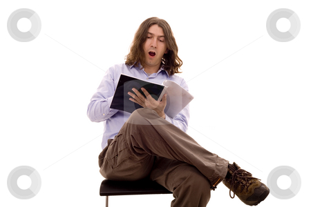 To use this stock image in your creative project, please select the size you need over to the right and click the "Add to Cart" button.
Your downloaded image will come with the Cutcaster watermark removed so don’t worry about the watermark you see on this page. Man on a desk stock photo, Man sited on a chair white isoalte by Marc Torrell