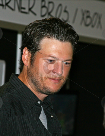 To use this stock image in your creative project, please select the size you need over to the right and click the "Add to Cart" button.
Your downloaded image will come with the Cutcaster watermark removed so don’t worry about the watermark you see on this page. Blake Shelton - CMA Festival 2009 stock photo, Blake Shelton at the CMA Music Festival June 11-14, 2009 in Nashville, Tennessee signing autographs by Dennis Crumrin
