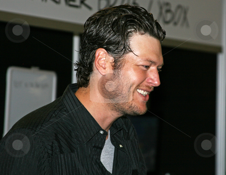 To use this stock image in your creative project, please select the size you need over to the right and click the "Add to Cart" button.
Your downloaded image will come with the Cutcaster watermark removed so don’t worry about the watermark you see on this page. Blake Shelton - CMA Festival 2009 stock photo, Blake Shelton at the CMA Music Festival June 11-14, 2009 in Nashville, Tennessee signing autographs by Dennis Crumrin