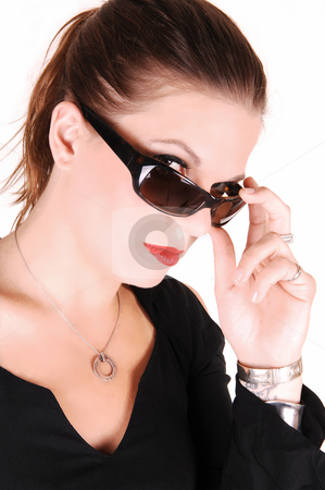 To use this stock image in your creative project, please select the size you need over to the right and click the "Add to Cart" button.
Your downloaded image will come with the Cutcaster watermark removed so don’t worry about the watermark you see on this page. Lady with sunglasses. stock photo, Elegant lady looking over her sunglasses and wearing a black dress
for white background in the studio. by Horst Petzold