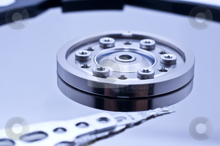 To use this stock image in your creative project, please select the size you need over to the right and click the "Add to Cart" button.
Your downloaded image will come with the Cutcaster watermark removed so don’t worry about the watermark you see on this page. Hard drive inside details stock photo, Closeup and macro view of hard drive inside by Kenneth Ro