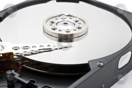 To use this stock image in your creative project, please select the size you need over to the right and click the "Add to Cart" button.
Your downloaded image will come with the Cutcaster watermark removed so don’t worry about the watermark you see on this page. Hard drive inside details stock photo, Closeup and macro view of hard drive inside by Kenneth Ro
