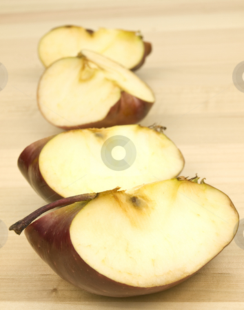 To use this stock image in your creative project, please select the size you need over to the right and click the "Add to Cart" button.
Your downloaded image will come with the Cutcaster watermark removed so don’t worry about the watermark you see on this page. Sliced apples in a row stock photo, Sliced apples in a row on a wooden background by John Teeter