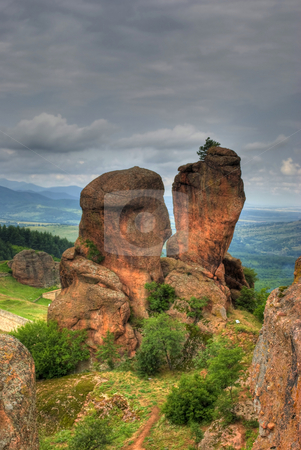 To use this stock image in your creative project, please select the size you need over to the right and click the "Add to Cart" button.
Your downloaded image will come with the Cutcaster watermark removed so don’t worry about the watermark you see on this page. Rock formation hdr stock photo, Rock formations - Belogradchishki skali Bulgaria by Desislava Dimitrova