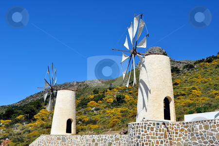To use this stock image in your creative project, please select the size you need over to the right and click the "Add to Cart" button.
Your downloaded image will come with the Cutcaster watermark removed so don’t worry about the watermark you see on this page. Wind mills in Crete stock photo, Travel photography: traditional wind mills in the Lassithi plateau, Crete. by Fernando Barozza