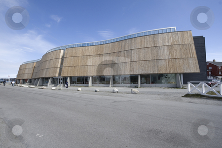 To use this stock image in your creative project, please select the size you need over to the right and click the "Add to Cart" button.
Your downloaded image will come with the Cutcaster watermark removed so don’t worry about the watermark you see on this page. Nuuk, culture center and cinema stock photo, The very beautiful and famous culture center of Nuuk, Greenland. Also houses a cinema and a restaurant. by Anders Peter