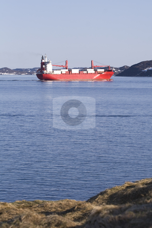 To use this stock image in your creative project, please select the size you need over to the right and click the "Add to Cart" button.
Your downloaded image will come with the Cutcaster watermark removed so don’t worry about the watermark you see on this page. Red container ship stock photo, Red container ship taking off into the north sea by Anders Peter
