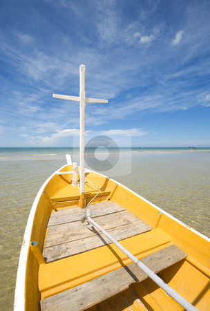 To use this stock image in your creative project, please select the size you need over to the right and click the "Add to Cart" button.
Your downloaded image will come with the Cutcaster watermark removed so don’t worry about the watermark you see on this page. White and Yellow Fishing Boat stock photo, A white and yellow fishing boat on the ocean beach on a bright sunny day. by Stefan Breton