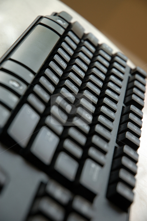 To use this stock image in your creative project, please select the size you need over to the right and click the "Add to Cart" button.
Your downloaded image will come with the Cutcaster watermark removed so don’t worry about the watermark you see on this page. Computer Keyboard stock photo, Detail of computer keyboard with shallow depth of field by dcslim