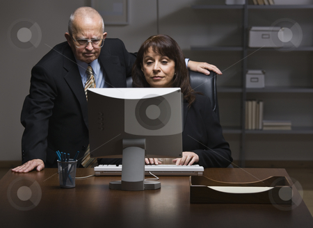 To use this stock image in your creative project, please select the size you need over to the right and click the "Add to Cart" button.
Your downloaded image will come with the Cutcaster watermark removed so don’t worry about the watermark you see on this page. Man and Woman Working on Computer stock photo, An elderly businessman and businesswoman are working together on a computer. They are looking away from the camera. Horizontally framed shot. by Jonathan Ross