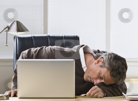 To use this stock image in your creative project, please select the size you need over to the right and click the "Add to Cart" button.
Your downloaded image will come with the Cutcaster watermark removed so don’t worry about the watermark you see on this page. Attractive man plugging in USB cord stock photo, Attractive man plugging in USB cord to laptop, while sitting at his desk. Horizontal by Jonathan Ross