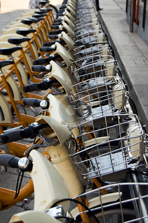 To use this stock image in your creative project, please select the size you need over to the right and click the "Add to Cart" button.
Your downloaded image will come with the Cutcaster watermark removed so don’t worry about the watermark you see on this page. Public bike sharing stock photo, A park for ecological city bike sharing by Roberto Marinello