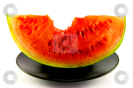 To use this stock image in your creative project, please select the size you need over to the right and click the "Add to Cart" button.
Your downloaded image will come with the Cutcaster watermark removed so don’t worry about the watermark you see on this page. Watermelon with Bite Mark stock photo, Slice of watermelon with green skin and red melon with seeds and bite mark on a black plate with a white background by Keith Wilson