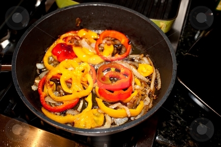 To use this stock image in your creative project, please select the size you need over to the right and click the "Add to Cart" button.
Your downloaded image will come with the Cutcaster watermark removed so don’t worry about the watermark you see on this page. Fried Bell Pepper Rings stock photo, Fried bell peppers are easy to make and great to eat. by Mariusz Jurgielewicz