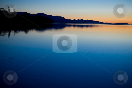 To use this stock image in your creative project, please select the size you need over to the right and click the "Add to Cart" button.
Your downloaded image will come with the Cutcaster watermark removed so don’t worry about the watermark you see on this page. Pacific Northwest Sunset stock photo, Sunset at Cline Spit in Sequim Washington. by Travis Manley