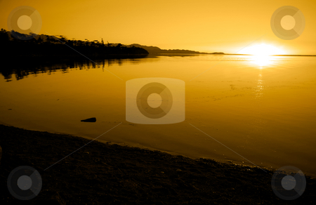 To use this stock image in your creative project, please select the size you need over to the right and click the "Add to Cart" button.
Your downloaded image will come with the Cutcaster watermark removed so don’t worry about the watermark you see on this page. Pacific Northwest Sunset stock photo, Sunset at Cline Spit in Sequim Washington. by Travis Manley