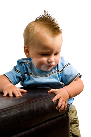 To use this stock image in your creative project, please select the size you need over to the right and click the "Add to Cart" button.
Your downloaded image will come with the Cutcaster watermark removed so don’t worry about the watermark you see on this page. Baby Boy Portrait Isolated stock photo, A portrait of a cute nine month old baby boy isolated on a while background. by Travis Manley