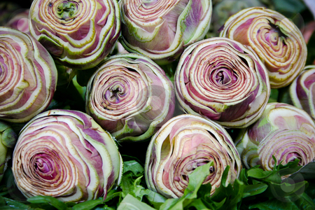 To use this stock image in your creative project, please select the size you need over to the right and click the "Add to Cart" button.
Your downloaded image will come with the Cutcaster watermark removed so don’t worry about the watermark you see on this page. Fresh artichokes on the market stock photo, Freshly cut artichoke hearts, for sale on the market by Wouter Roesems