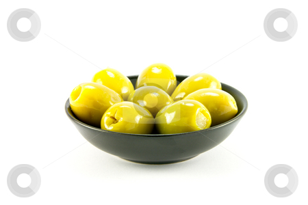 To use this stock image in your creative project, please select the size you need over to the right and click the "Add to Cart" button.
Your downloaded image will come with the Cutcaster watermark removed so don’t worry about the watermark you see on this page. Olives in a Bowl stock photo, Green olives in a small round black bowl on a white background by Keith Wilson