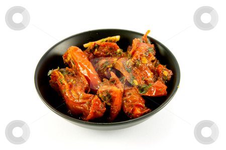 To use this stock image in your creative project, please select the size you need over to the right and click the "Add to Cart" button.
Your downloaded image will come with the Cutcaster watermark removed so don’t worry about the watermark you see on this page. Sun Dried Tomatoes stock photo, Pile of red sun dried tomatoes in a small black dish on a white background by Keith Wilson