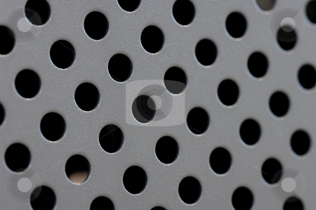 To use this stock image in your creative project, please select the size you need over to the right and click the "Add to Cart" button.
Your downloaded image will come with the Cutcaster watermark removed so don’t worry about the watermark you see on this page. Round Steel Holes stock photo, Round steel holes for backgrounds or textures. by Peter Soderstrom