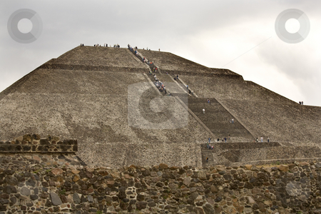 To use this stock image in your creative project, please select the size you need over to the right and click the "Add to Cart" button.
Your downloaded image will come with the Cutcaster watermark removed so don’t worry about the watermark you see on this page. Sun Pyramid Teotihuacan Mexico stock photo, Sun Pyramid Teotihuacan Mexico Climbing up the Stairs by William Perry