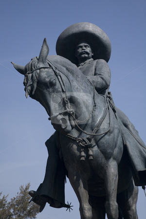 To use this stock image in your creative project, please select the size you need over to the right and click the "Add to Cart" button.
Your downloaded image will come with the Cutcaster watermark removed so don’t worry about the watermark you see on this page. Zapata Statue Toluca Mexico Close Up stock photo, Close up of huge statue of Emiliano Zapata, revolutionary hero, on horse Toluca, Mexico by William Perry