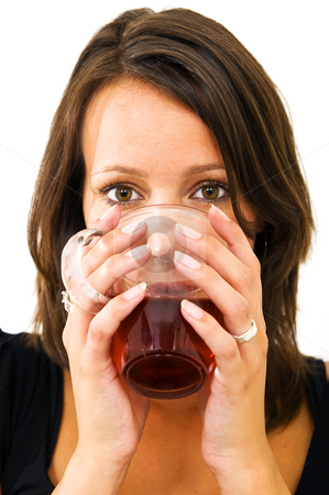 To use this stock image in your creative project, please select the size you need over to the right and click the "Add to Cart" button.
Your downloaded image will come with the Cutcaster watermark removed so don’t worry about the watermark you see on this page. Drinking tea stock photo, Young woman drinking tea from a glass, holding it comfortably with two hands by Corepics VOF