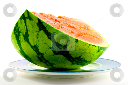 To use this stock image in your creative project, please select the size you need over to the right and click the "Add to Cart" button.
Your downloaded image will come with the Cutcaster watermark removed so don’t worry about the watermark you see on this page. Watermelon stock photo, Slice of watermelon with green skin and red melon with seeds on a blue plate with a white background by Keith Wilson